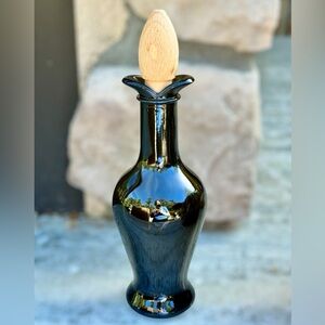 Tulip shaped dark green oil/vinegar cruet with wooden stopper